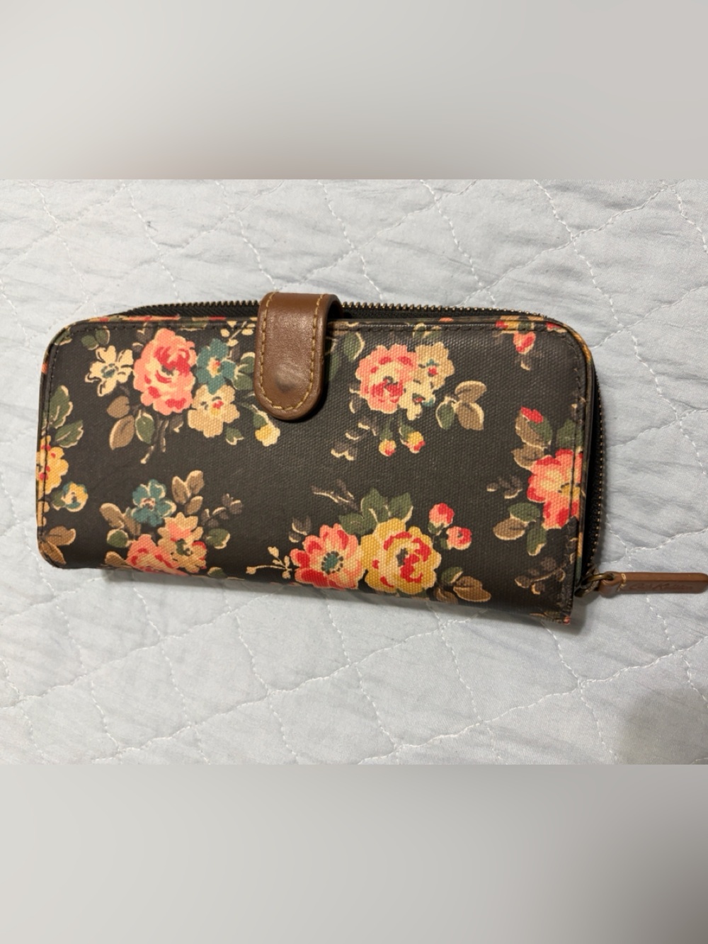 Cath Kidston London wallet features a beautiful black floral pattern zip around